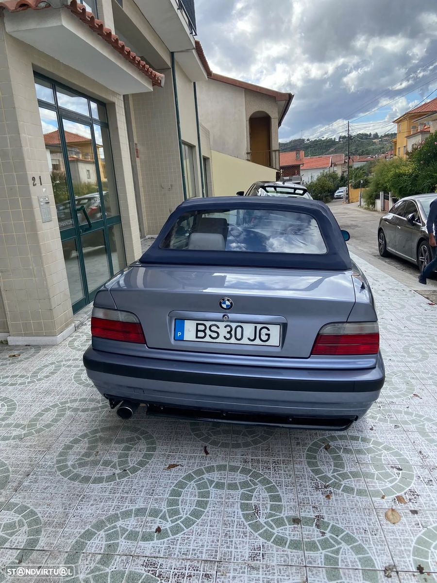 BMW 318 — foto 3 de 14